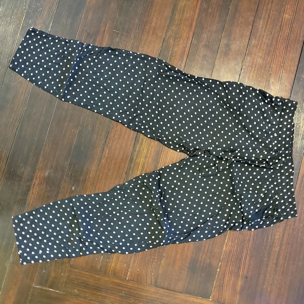 Black pants with white polka dots